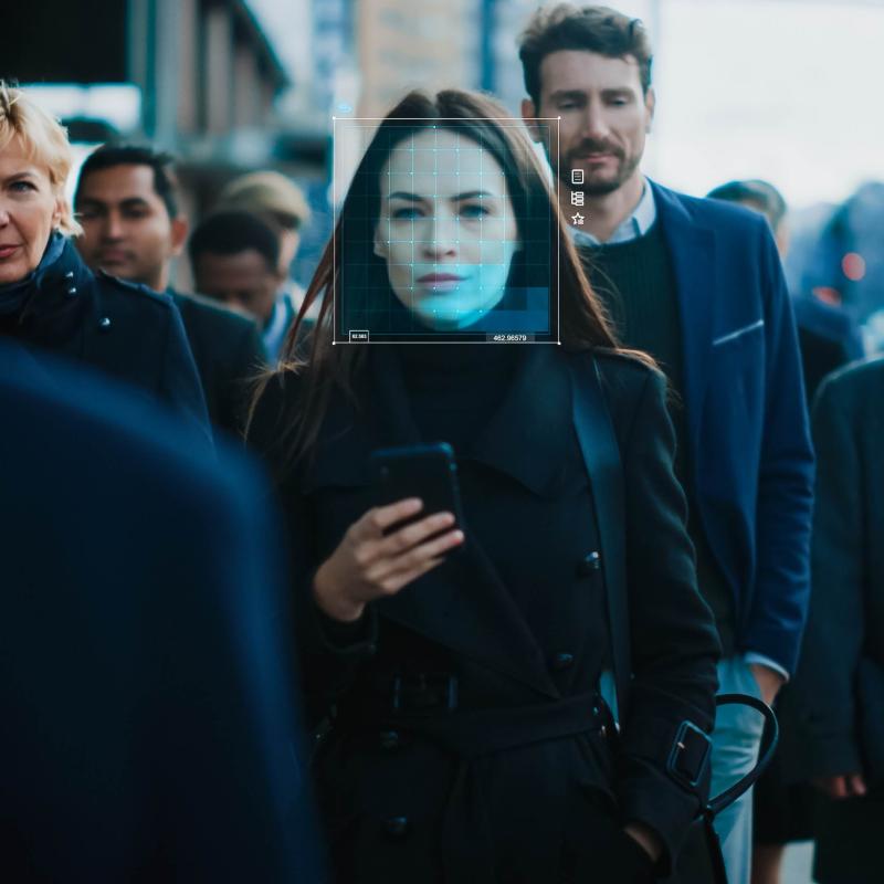 Grafika ilustrująca biometryczne rozpoznawanie twarzy